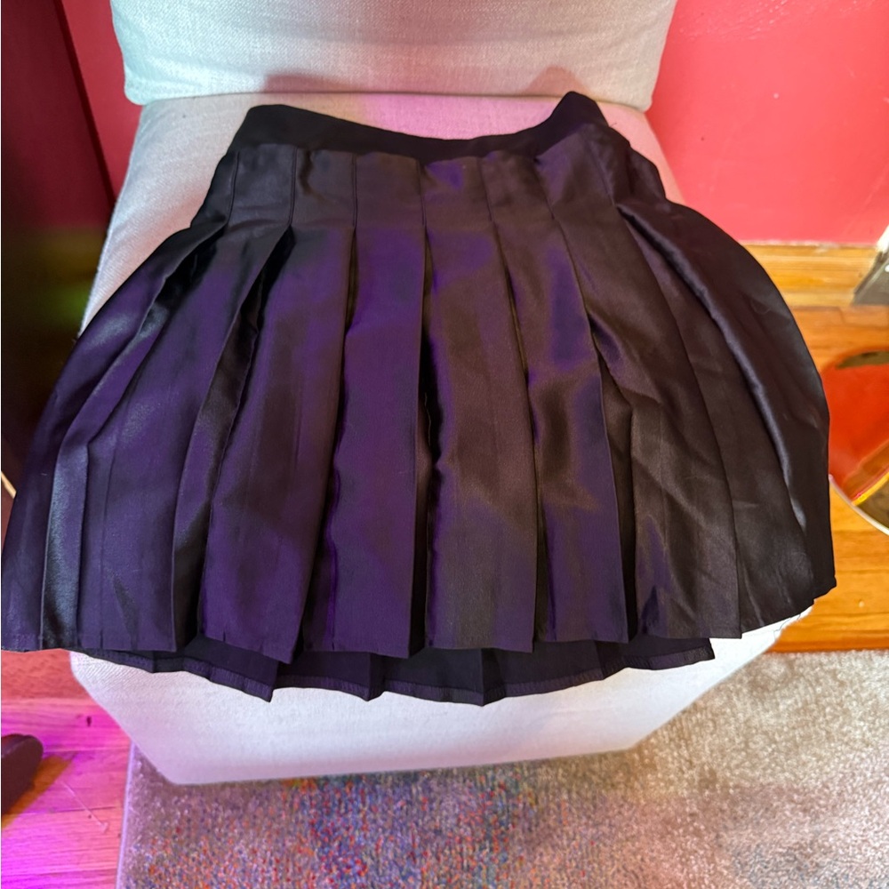 Elegant Black Pleated Skirt with shorts underneath